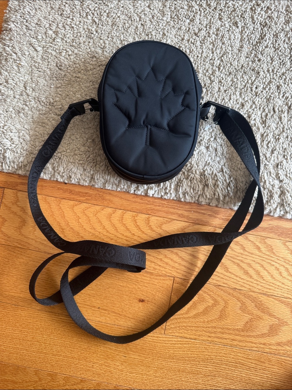 Lululemon Olympic Black Quilted Crossbody Bag with Maple Leaf  Stitching